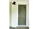 Modern front door with arched window detail at 1222 Bronx Nw St, Atlanta, GA 30314