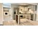 Open concept kitchen with island and view into living room at 1222 Bronx Nw St, Atlanta, GA 30314