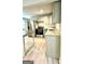 Modern kitchen with gray cabinets and granite countertops at 1222 Bronx Nw St, Atlanta, GA 30314