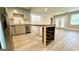 Modern kitchen with gray cabinets, granite counters, and island at 1222 Bronx Nw St, Atlanta, GA 30314