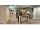 Open kitchen features stainless steel appliances and breakfast bar at 1222 Bronx Nw St, Atlanta, GA 30314