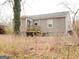 Ranch home with a deck and a large backyard at 561 Commercial Nw Ave, Atlanta, GA 30318