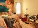 Bedroom with double bed and ocean-themed wall art at 561 Commercial Nw Ave, Atlanta, GA 30318