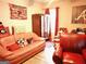 Spacious living room with a comfy peach couch at 561 Commercial Nw Ave, Atlanta, GA 30318