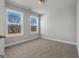 Bright bedroom with neutral walls and carpet at 172 Austin Dr, Mcdonough, GA 30252