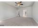 Spacious bedroom with ceiling fan and carpeting at 172 Austin Dr, Mcdonough, GA 30252