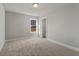 Bright bedroom with neutral walls and carpet at 172 Austin Dr, Mcdonough, GA 30252