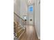 Bright entryway with hardwood floors, staircase, and high ceilings at 172 Austin Dr, Mcdonough, GA 30252
