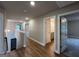 Upstairs hallway with light wood flooring at 172 Austin Dr, Mcdonough, GA 30252
