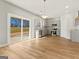 Modern kitchen with gray cabinets, stainless steel appliances, and hardwood floors at 172 Austin Dr, Mcdonough, GA 30252