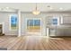 Modern kitchen with gray cabinets, stainless steel appliances and access to backyard at 172 Austin Dr, Mcdonough, GA 30252