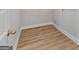 Laundry area with light wood-look flooring at 172 Austin Dr, Mcdonough, GA 30252