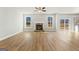 Spacious living room with hardwood floors, fireplace and sliding glass doors at 172 Austin Dr, Mcdonough, GA 30252