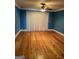 Bright bedroom with hardwood floors and sliding glass doors at 97 Willowick Dr, Lithonia, GA 30038