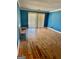Spacious living room with hardwood floors and sliding doors at 97 Willowick Dr, Lithonia, GA 30038
