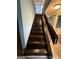 Wooden staircase leading to the second floor at 97 Willowick Dr, Lithonia, GA 30038