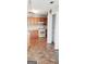 Kitchen with tile flooring, wood cabinetry, white appliances, and pantry at 1611 Cobbs Creek Ln, Decatur, GA 30032
