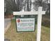 Community welcome sign reads 'Peachcrest Trace', governed by HOA annual dues apply at 1611 Cobbs Creek Ln, Decatur, GA 30032