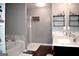 Elegant bathroom with double vanity and a soaking tub at 1058 Mays Hill, Atlanta, GA 30336