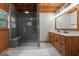 Modern bathroom with double vanity and walk-in shower at 184 Elm St, Covington, GA 30014