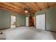 Main bedroom with wood features and access to bathroom at 184 Elm St, Covington, GA 30014
