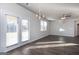 Bright dining room features hardwood floors and a chandelier at 157 Aster Ave, Locust Grove, GA 30248