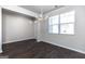 Simple dining room with hardwood floors and natural light at 157 Aster Ave, Locust Grove, GA 30248