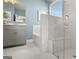 Bathroom with walk in shower and separate tub at 603 Parnassus Rd, Locust Grove, GA 30248