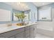Double vanity bathroom with a soaking tub and shower at 603 Parnassus Rd, Locust Grove, GA 30248