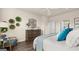 Spacious bedroom with wood floors and plenty of natural light at 603 Parnassus Rd, Locust Grove, GA 30248