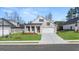 New construction home with brick facade and two-car garage at 603 Parnassus Rd, Locust Grove, GA 30248