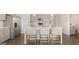 Open kitchen with island and stainless steel appliances at 603 Parnassus Rd, Locust Grove, GA 30248