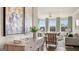 Bright living room with green accents and large windows at 603 Parnassus Rd, Locust Grove, GA 30248
