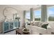 Spacious living area featuring a large mirror and ample natural light at 603 Parnassus Rd, Locust Grove, GA 30248
