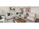 Open living room with view of the kitchen and dining area at 603 Parnassus Rd, Locust Grove, GA 30248