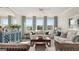 Spacious living room boasts ample natural light and comfortable seating at 603 Parnassus Rd, Locust Grove, GA 30248