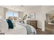 Main bedroom with dresser and view into dining area at 603 Parnassus Rd, Locust Grove, GA 30248