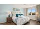 Spacious main bedroom with light blue walls and large windows at 603 Parnassus Rd, Locust Grove, GA 30248