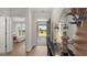 Home's foyer with a view to the main bedroom and front yard at 592 Parnassus Rd, Locust Grove, GA 30248