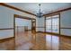 Bright dining room with hardwood floors and a chandelier at 353 Gum Creek Rd, Oxford, GA 30054