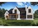 Home features a covered patio, pool and lush landscaping at 0 Matteo Way # 5, Fayetteville, GA 30215