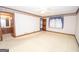 Spacious bedroom with ample natural light and ceiling fan at 215 Creekside Trl, Fayetteville, GA 30214