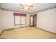 Spacious bedroom featuring a large closet and ceiling fan at 215 Creekside Trl, Fayetteville, GA 30214