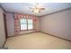 Bright bedroom with ample space and neutral carpeting at 215 Creekside Trl, Fayetteville, GA 30214