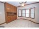 Dining area with built-in cabinetry and bay window at 215 Creekside Trl, Fayetteville, GA 30214