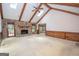 Living room with stone fireplace and vaulted ceiling at 215 Creekside Trl, Fayetteville, GA 30214