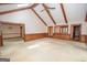 Spacious living room with vaulted ceiling and wood paneling at 215 Creekside Trl, Fayetteville, GA 30214
