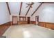 Spacious living room with vaulted ceiling and wood paneling at 215 Creekside Trl, Fayetteville, GA 30214