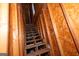 Unfinished attic access via wooden staircase at 12178 Brown Bridge Rd, Covington, GA 30016