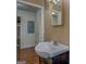 Simple bathroom with a vanity and mirror at 12178 Brown Bridge Rd, Covington, GA 30016